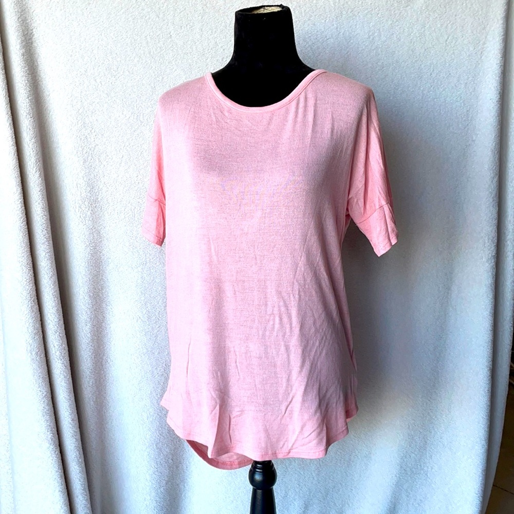 NWT, short-sleeved, criss-cross open back. Size L